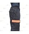Pantalones con refuerzos y cintas bicolor reflectantes en bajos y tapetas