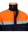 Chubasquero bicolor con cintas reflectantes segmentadas y membrana PTFE para Protección Civil