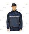 Jersey softshell monocolor azul marino con damero reflectante y membrana PU para Policía Local