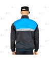 Jersey softshell bicolor con membrana y cinta reflectante color marino y azul tropical para Policía Local