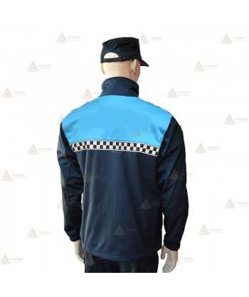 Chaqueta softshell color azul marino y azul tropical con damero reflectante y membrana PU para Policía Local