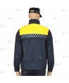 Cazadora softshell bicolor azul marino y amarillo flúor con damero reflectante y membrana PU impermeable  para Policía Local