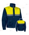 Cazadora softshell color azul marino y amarillo flúor con damero reflectante y membrana PTFE para Policía Local