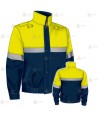 Cazadora softshell de motoristas color azul marino y amarillo flúor con cinta reflectante y membrana PTFE para Policía Local