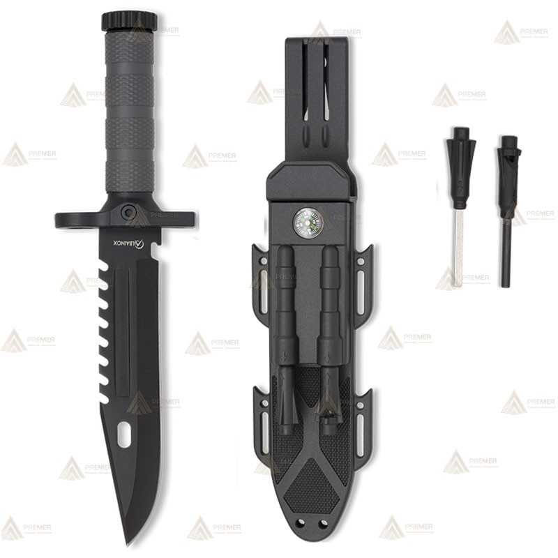 Cuchillo con hoja calada de 19 cm, con acabado negro. Funda de ABS. Incluye pedernal y afilador